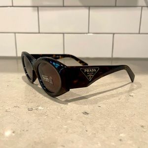 Prada Tortoise Beveled Oval Sunglasses